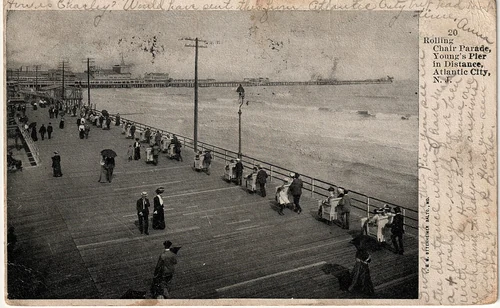 1907-09-12 Rolling chair parade, Young's Pier in distance, Atlantic City NJ A